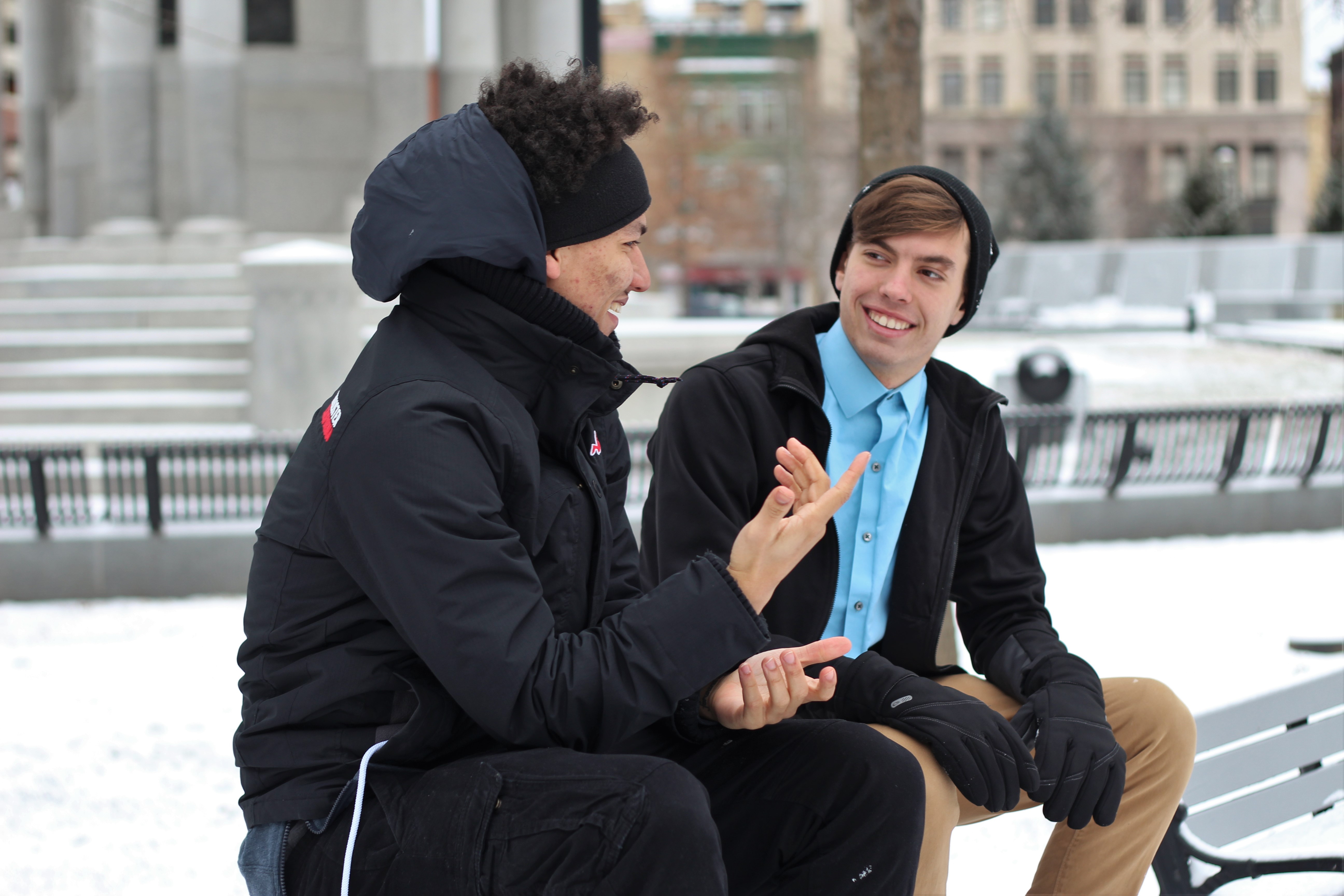 two men bench snow